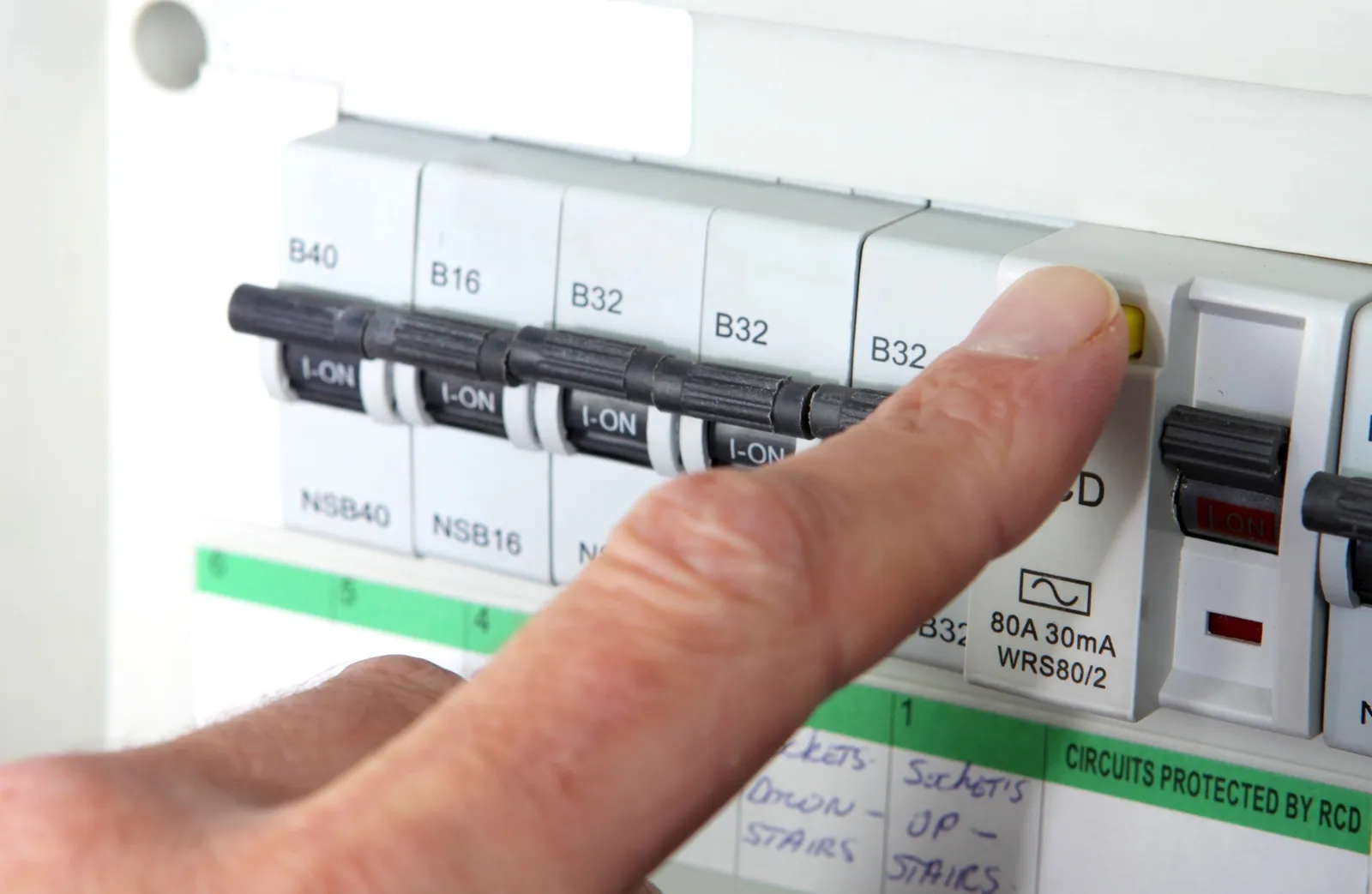 Modern consumer unit being installed by an electrician in Warwickshire